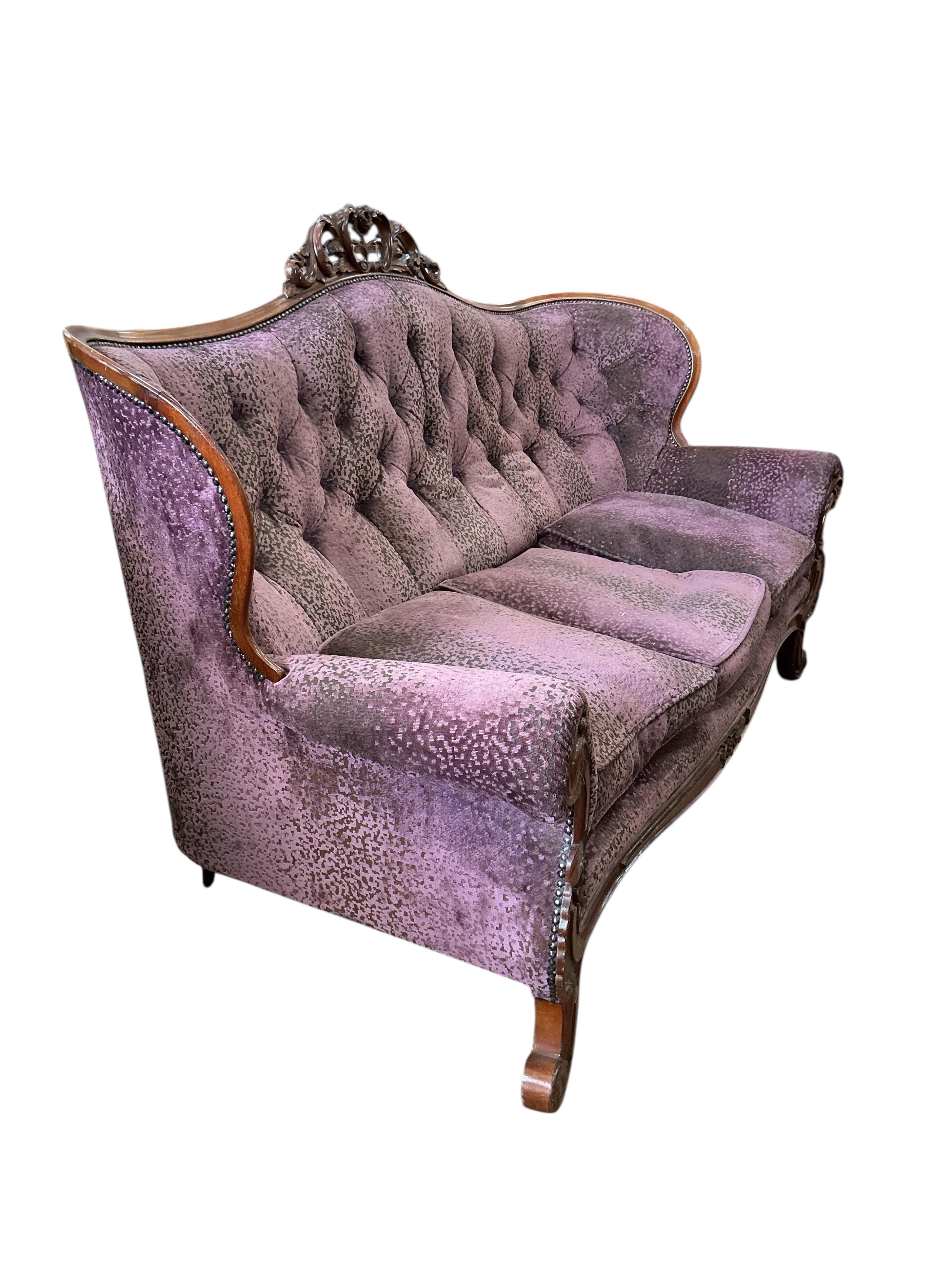 A 19th century Continental carved mahogany settee, width 218cm, depth 80cm, height 118cm